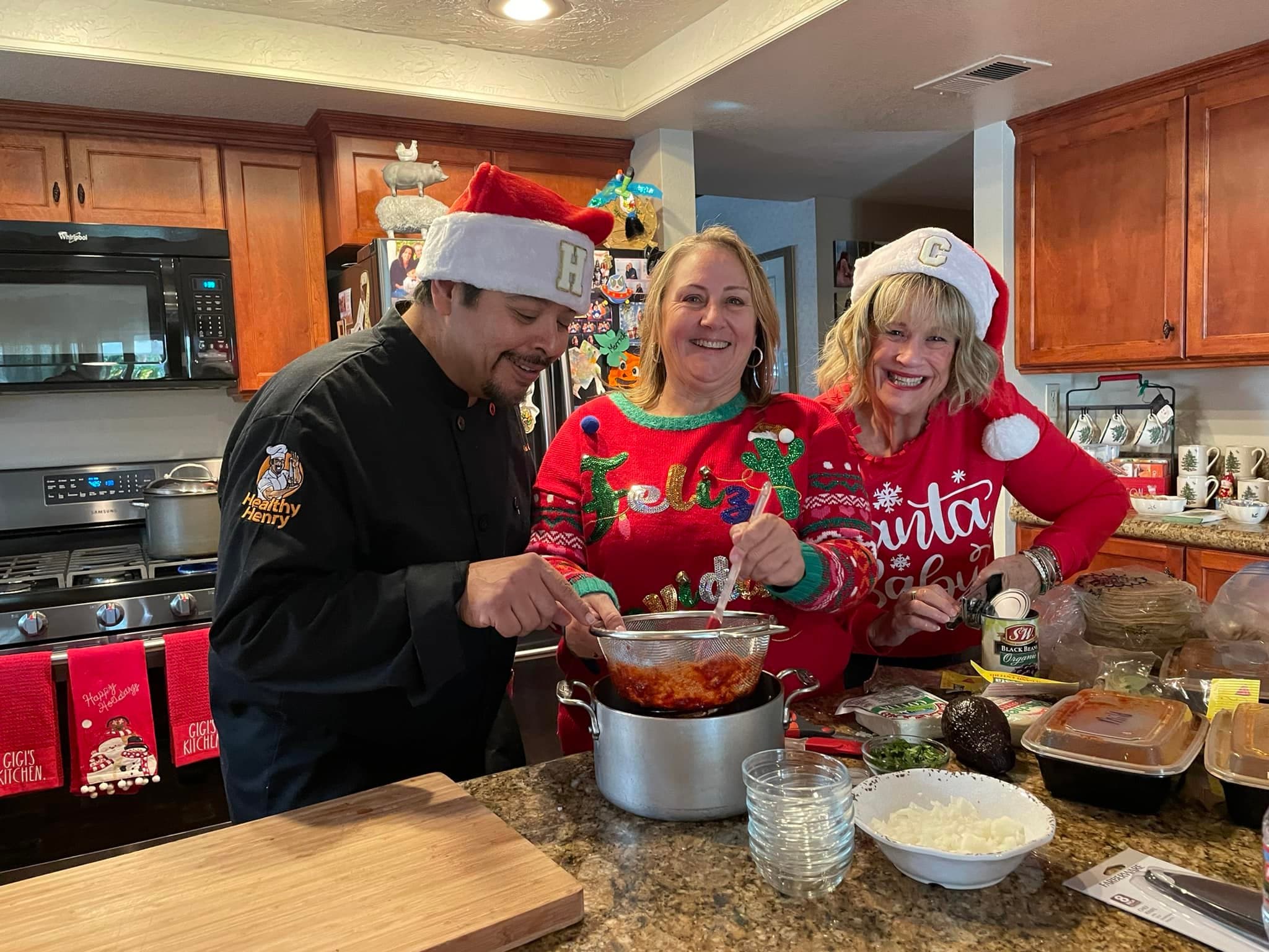 Henry cooking a holiday meal with community members